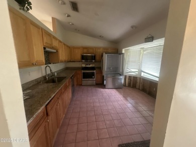Are you an investor or homebuyer looking for a project? This on Daytona Beach Golf Club in Florida - for sale on GolfHomes.com, golf home, golf lot