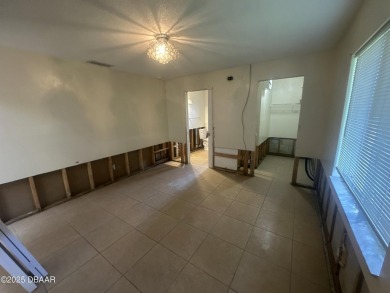 Are you an investor or homebuyer looking for a project? This on Daytona Beach Golf Club in Florida - for sale on GolfHomes.com, golf home, golf lot