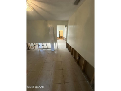Are you an investor or homebuyer looking for a project? This on Daytona Beach Golf Club in Florida - for sale on GolfHomes.com, golf home, golf lot
