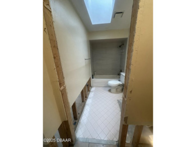 Are you an investor or homebuyer looking for a project? This on Daytona Beach Golf Club in Florida - for sale on GolfHomes.com, golf home, golf lot