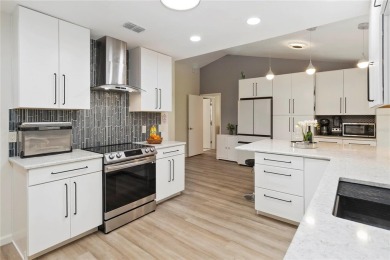 Welcome to 1008 Jackson Creek Court, a beautifully updated home on Twin Rivers Golf Club in Florida - for sale on GolfHomes.com, golf home, golf lot