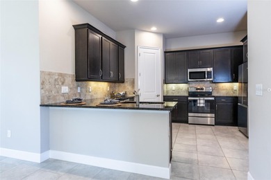 One or more photo(s) has been virtually staged. Welcome to on Plantation Bay Golf and Country Club in Florida - for sale on GolfHomes.com, golf home, golf lot