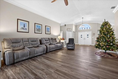 Refined Florida living awaits in this beautifully maintained on The Grand Club - Pine Lakes Course in Florida - for sale on GolfHomes.com, golf home, golf lot