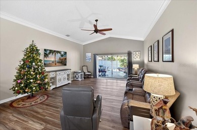 Refined Florida living awaits in this beautifully maintained on The Grand Club - Pine Lakes Course in Florida - for sale on GolfHomes.com, golf home, golf lot