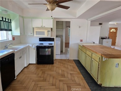 This home offers incredible potential for the right buyer or on Sands RV and Golf Resort in California - for sale on GolfHomes.com, golf home, golf lot