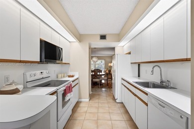 Best priced, largest golf course facing 2/2 condo in Century on  in Florida - for sale on GolfHomes.com, golf home, golf lot