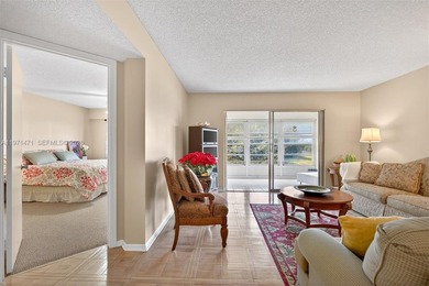 Best priced, largest golf course facing 2/2 condo in Century on  in Florida - for sale on GolfHomes.com, golf home, golf lot