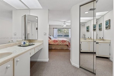 Best priced, largest golf course facing 2/2 condo in Century on  in Florida - for sale on GolfHomes.com, golf home, golf lot