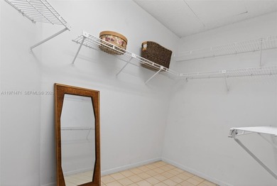 Best priced, largest golf course facing 2/2 condo in Century on  in Florida - for sale on GolfHomes.com, golf home, golf lot