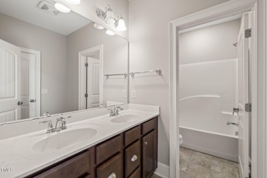 Former Model Home in 12 Oaks - Fully Loaded  Move-In Ready. This on The Club At Twelve Oaks in North Carolina - for sale on GolfHomes.com, golf home, golf lot