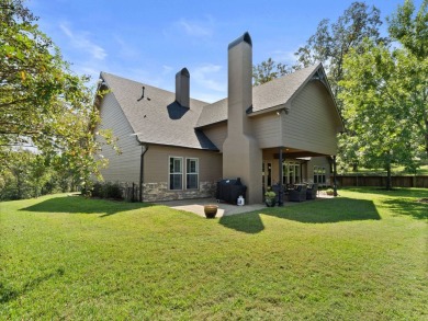 This home on Toledo Bend Lake will keep you on your patio lost on Cypress Bend Golf Resort in Louisiana - for sale on GolfHomes.com, golf home, golf lot