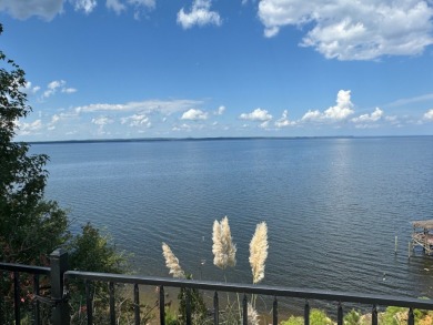 This home on Toledo Bend Lake will keep you on your patio lost on Cypress Bend Golf Resort in Louisiana - for sale on GolfHomes.com, golf home, golf lot