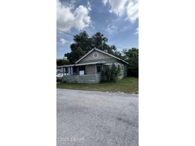 Here's your chance to renovate a home in the highly desirable on New Smyrna Beach Golf Course in Florida - for sale on GolfHomes.com, golf home, golf lot