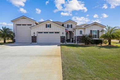 RV Garage home with waterfront living at its best, on a spacious on Golf Club At North Hampton in Florida - for sale on GolfHomes.com, golf home, golf lot