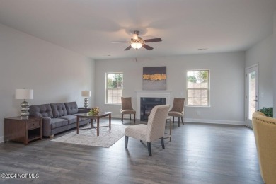 Photos are of a similar home in the same community. This brick on Lennon Hills Golf Course in North Carolina - for sale on GolfHomes.com, golf home, golf lot
