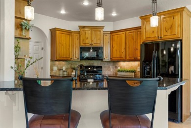 This picturesque home is located just minutes east of downtown on Canyon River Golf Club in Montana - for sale on GolfHomes.com, golf home, golf lot