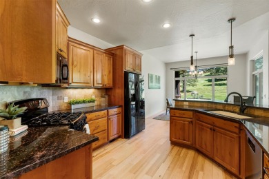 This picturesque home is located just minutes east of downtown on Canyon River Golf Club in Montana - for sale on GolfHomes.com, golf home, golf lot
