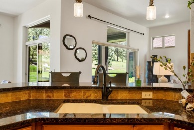 This picturesque home is located just minutes east of downtown on Canyon River Golf Club in Montana - for sale on GolfHomes.com, golf home, golf lot