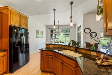 This picturesque home is located just minutes east of downtown on Canyon River Golf Club in Montana - for sale on GolfHomes.com, golf home, golf lot