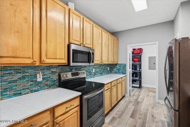 Coastal Comfort in Calabash - Modern Condo with Golf Course on Crow Creek Golf Club in North Carolina - for sale on GolfHomes.com, golf home, golf lot