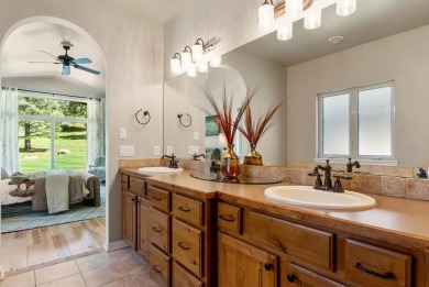 This picturesque home is located just minutes east of downtown on Canyon River Golf Club in Montana - for sale on GolfHomes.com, golf home, golf lot