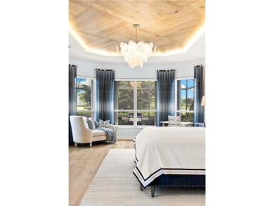 This stunning residence has been completely reimagined by the on The Club At Strand in Florida - for sale on GolfHomes.com, golf home, golf lot