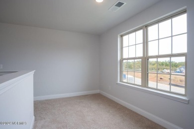 New Home in Palmetto Creek with a view of the pond in the on Lennon Hills Golf Course in North Carolina - for sale on GolfHomes.com, golf home, golf lot