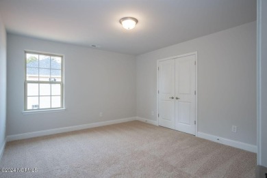 New Home in Palmetto Creek with a view of the pond in the on Lennon Hills Golf Course in North Carolina - for sale on GolfHomes.com, golf home, golf lot