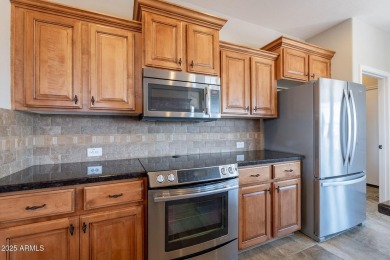 Situated on a spacious corner homesite, this beautiful turn-key on Encanterra Country Club in Arizona - for sale on GolfHomes.com, golf home, golf lot