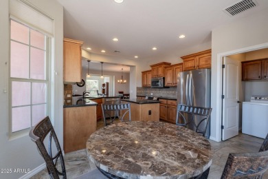 Situated on a spacious corner homesite, this beautiful turn-key on Encanterra Country Club in Arizona - for sale on GolfHomes.com, golf home, golf lot