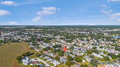 Don't miss this fantastic opportunity to own a beautifully on Chula Vista Executive Golf Course in Florida - for sale on GolfHomes.com, golf home, golf lot