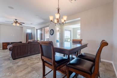 Situated on a spacious corner homesite, this beautiful turn-key on Encanterra Country Club in Arizona - for sale on GolfHomes.com, golf home, golf lot