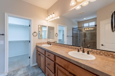 Situated on a spacious corner homesite, this beautiful turn-key on Encanterra Country Club in Arizona - for sale on GolfHomes.com, golf home, golf lot