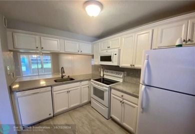 Welcome to this beautifully updated 2-bedroom, 2-bathroom condo on Wynmoor Golf Course in Florida - for sale on GolfHomes.com, golf home, golf lot