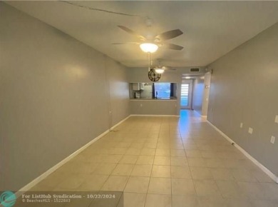 Welcome to this beautifully updated 2-bedroom, 2-bathroom condo on Wynmoor Golf Course in Florida - for sale on GolfHomes.com, golf home, golf lot