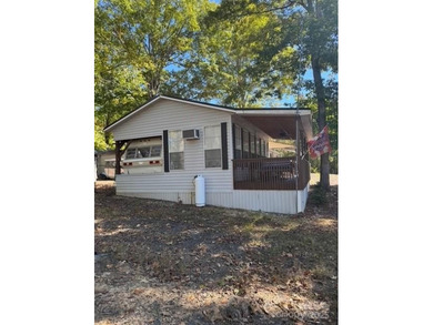 Motivated Sellers! Great Deal with a Lake View and COMES WITH A on The Tillery Tradition Country Club in North Carolina - for sale on GolfHomes.com, golf home, golf lot