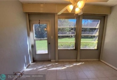 Welcome to this beautifully updated 2-bedroom, 2-bathroom condo on Wynmoor Golf Course in Florida - for sale on GolfHomes.com, golf home, golf lot