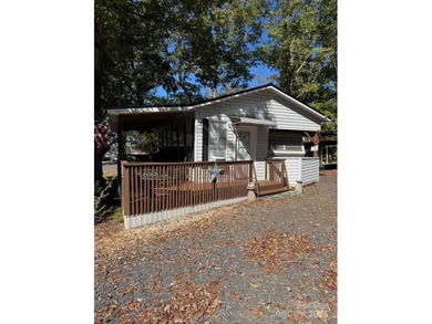 Motivated Sellers! Great Deal with a Lake View and COMES WITH A on The Tillery Tradition Country Club in North Carolina - for sale on GolfHomes.com, golf home, golf lot