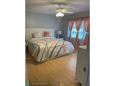 Welcome to this beautifully updated 2-bedroom, 2-bathroom condo on Wynmoor Golf Course in Florida - for sale on GolfHomes.com, golf home, golf lot