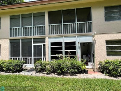 Welcome to this beautifully updated 2-bedroom, 2-bathroom condo on Wynmoor Golf Course in Florida - for sale on GolfHomes.com, golf home, golf lot