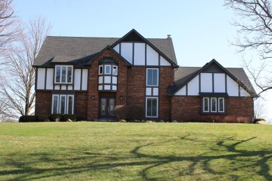 Stunning Colonial overlooking the #12 Green and Fairway in on Travis Pointe Country Club in Michigan - for sale on GolfHomes.com, golf home, golf lot