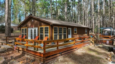 The Ultimate Holly Lake Retreat: Modern Updates & Resort Living
 on Holly Lake Ranch Golf Club in Texas - for sale on GolfHomes.com, golf home, golf lot