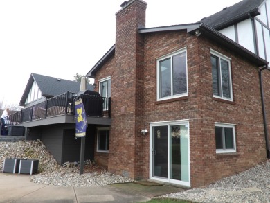 Stunning Colonial overlooking the #12 Green and Fairway in on Travis Pointe Country Club in Michigan - for sale on GolfHomes.com, golf home, golf lot