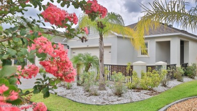 Welcome to your dream home in the prestigious Palms neighborhood on Venetian Bay Golf Course in Florida - for sale on GolfHomes.com, golf home, golf lot