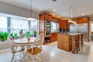 Welcome to this stunning corner-lot home in the exclusive gated on Hackberry Creek Country Club in Texas - for sale on GolfHomes.com, golf home, golf lot