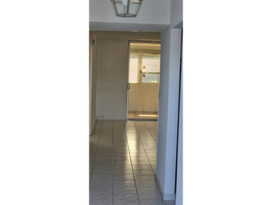 Spacious and bright 2-bed, 2-bath + den/office condo in Palm on Oriole Golf and Tennis Club in Florida - for sale on GolfHomes.com, golf home, golf lot