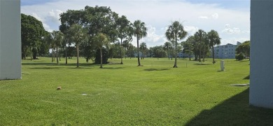 Spacious and bright 2-bed, 2-bath + den/office condo in Palm on Oriole Golf and Tennis Club in Florida - for sale on GolfHomes.com, golf home, golf lot