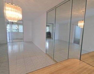 Spacious and bright 2-bed, 2-bath + den/office condo in Palm on Oriole Golf and Tennis Club in Florida - for sale on GolfHomes.com, golf home, golf lot