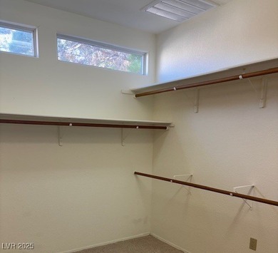 From the front courtyd entry to the views accessible from inside on Highland Falls Golf Club in Nevada - for sale on GolfHomes.com, golf home, golf lot