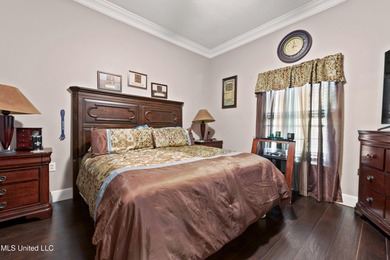 Experience timeless elegance and custom craftsmanship in this on Diamondhead Country Club in Mississippi - for sale on GolfHomes.com, golf home, golf lot